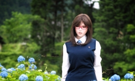 High school girl in hydrangea garden