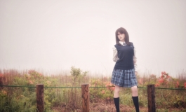 School girl in the fog
